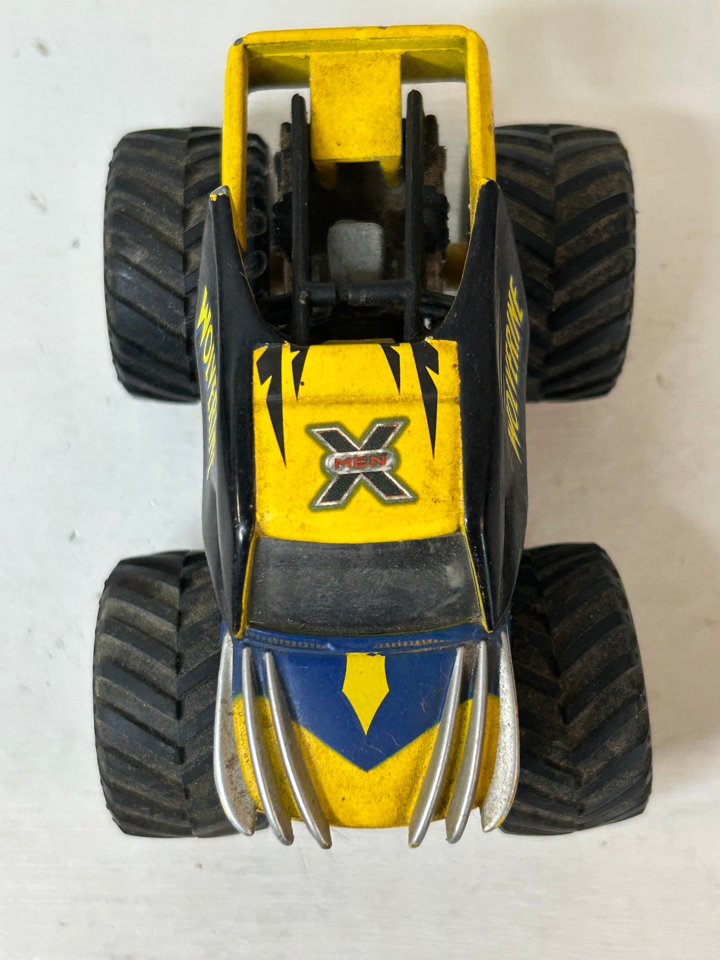 Yellow & Blue Monster Truck Toy Vehicle – X Graphic Off-Road Truck