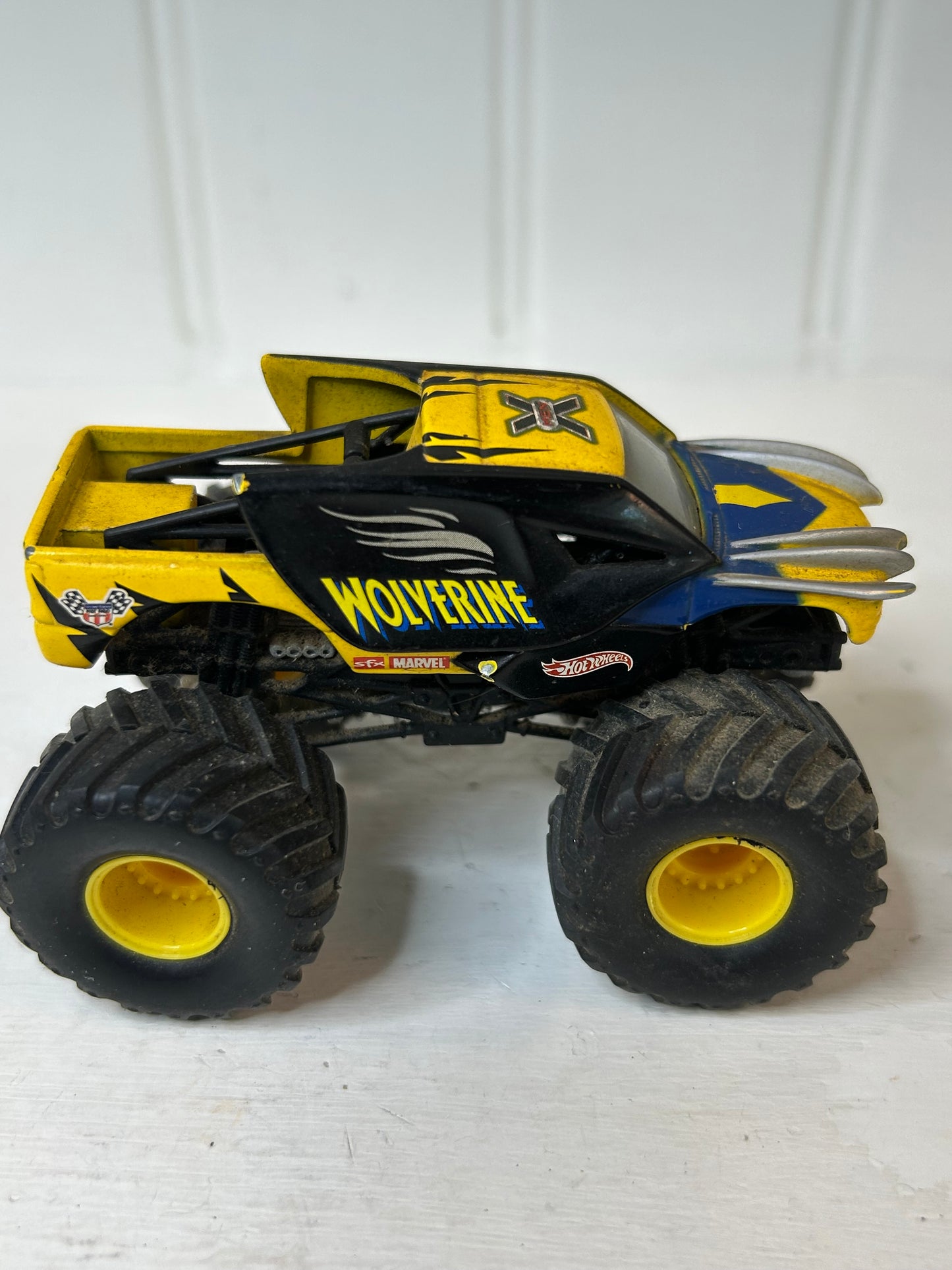 Yellow & Blue Monster Truck Toy Vehicle – X Graphic Off-Road Truck