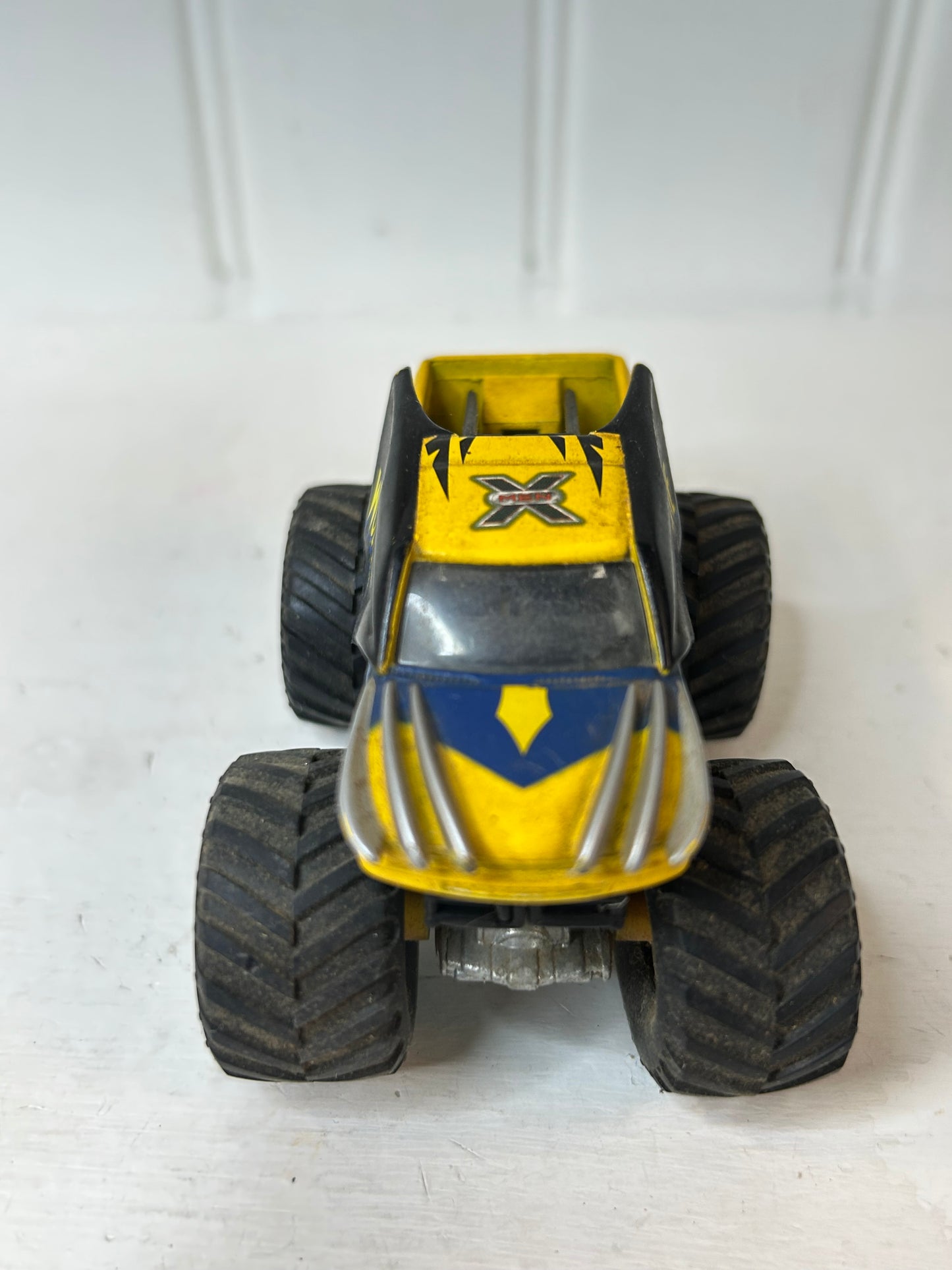 Yellow & Blue Monster Truck Toy Vehicle – X Graphic Off-Road Truck