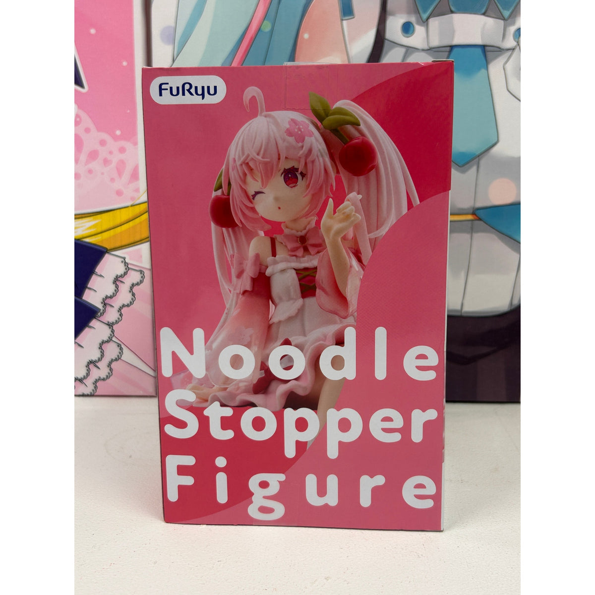 Hatsune Miku Sakura Miku 2025 Wink Noodle Stopper Figure – FuRyu