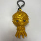 Original reference photo of the gold Joker figural bag clip on white background