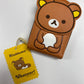 Original front flat lay photo of Rilakkuma Card Wallet with yellow paper tag