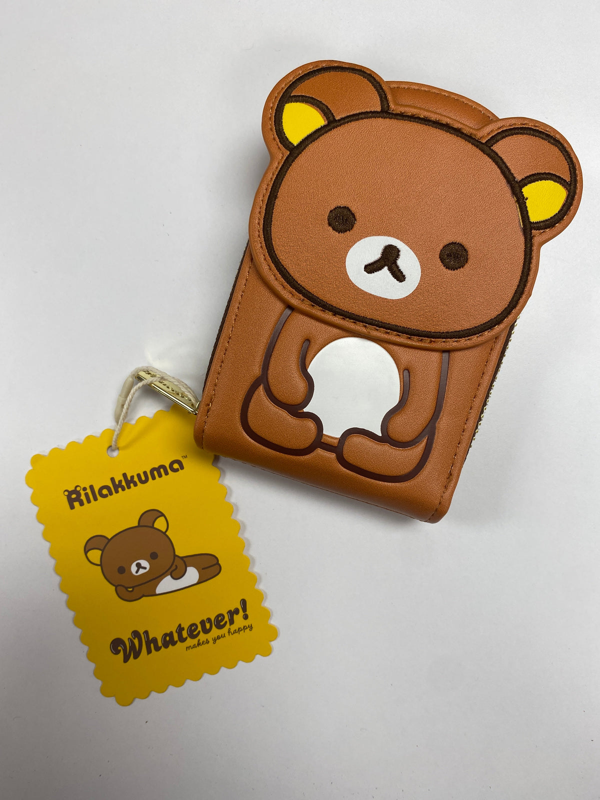 Original front flat lay photo of Rilakkuma Card Wallet with yellow paper tag