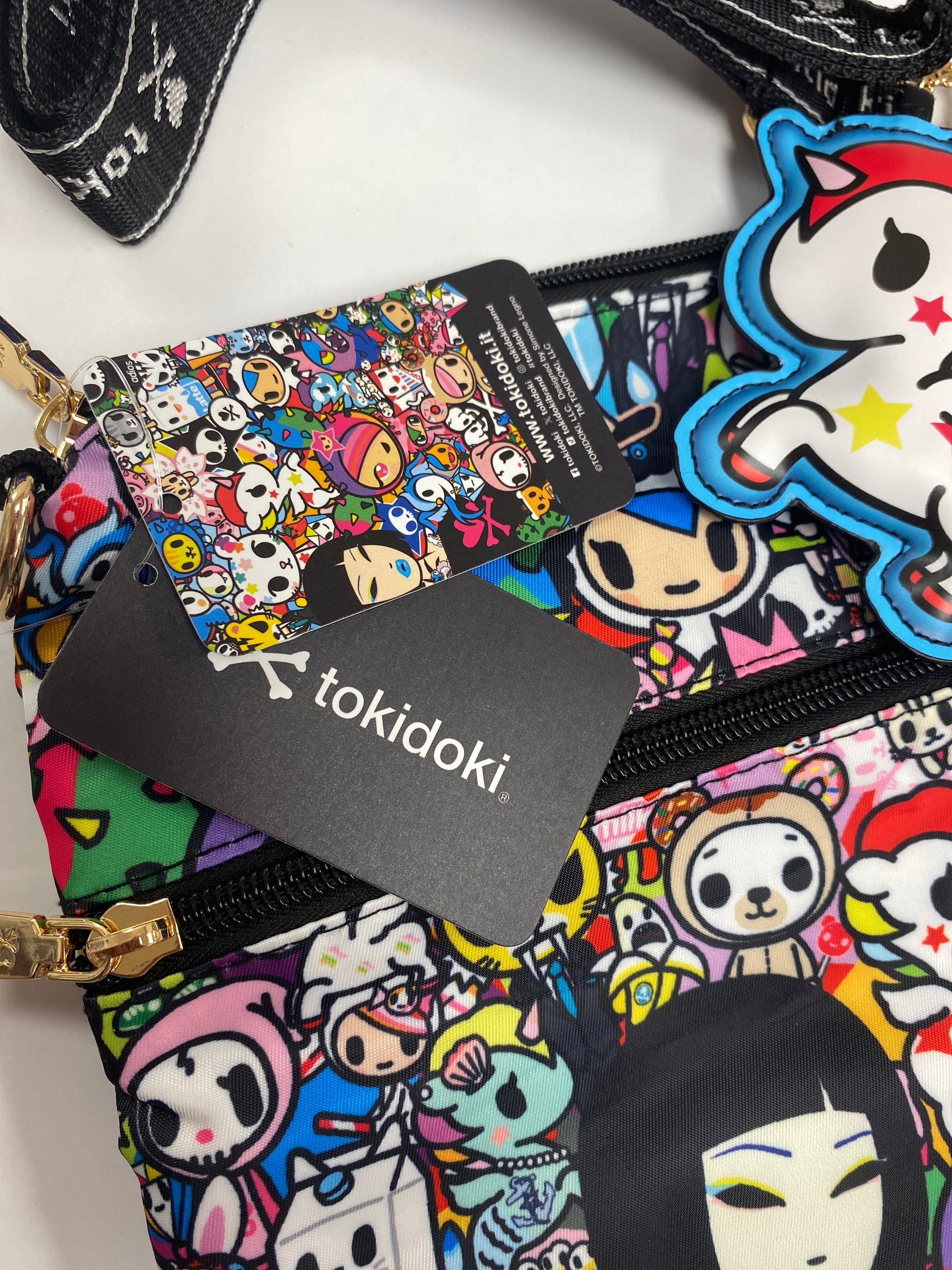Original detail of tokidoki product tags and unicorn charm