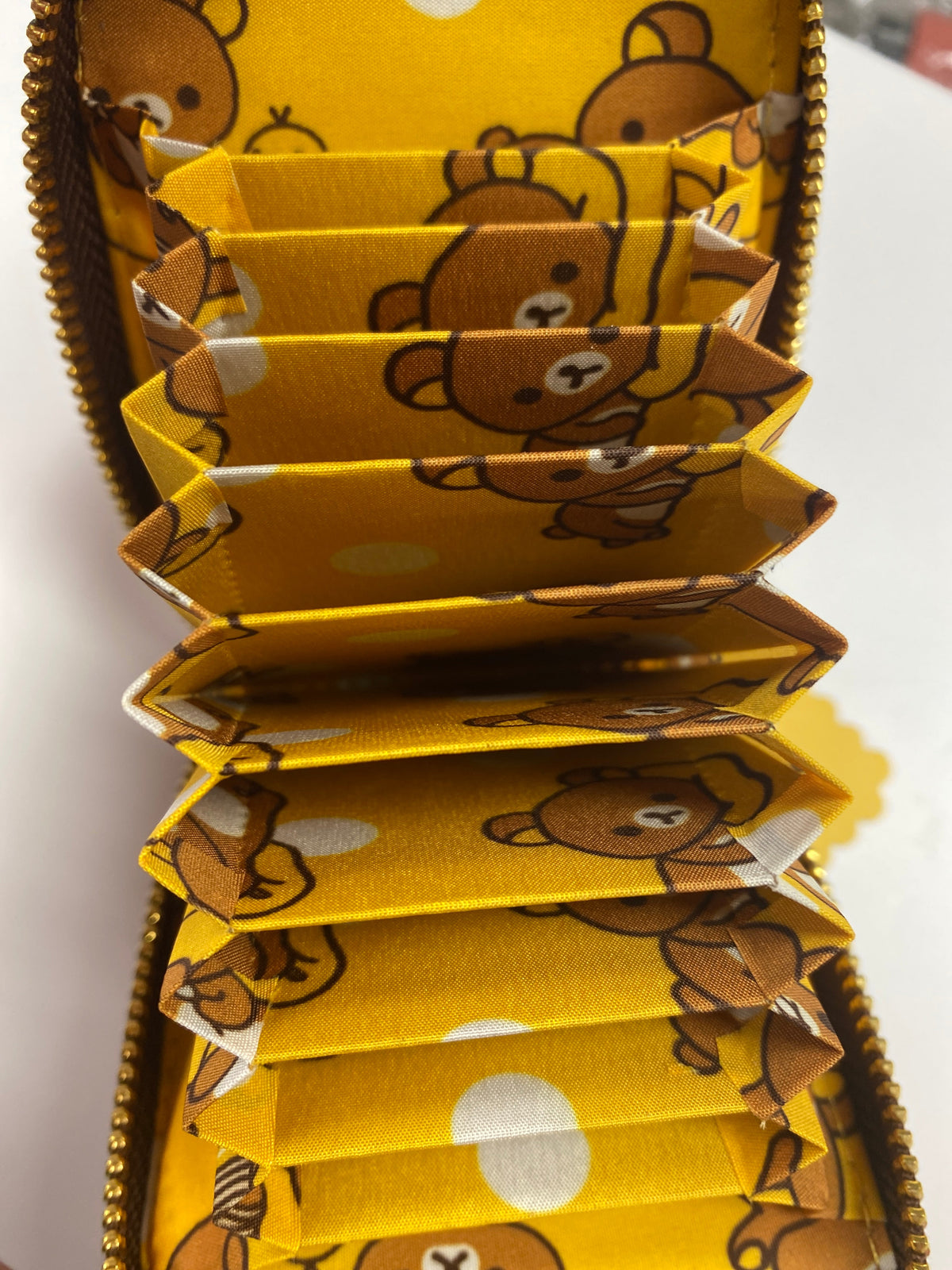 Original open interior photo of the card wallet slots with custom fabric lining