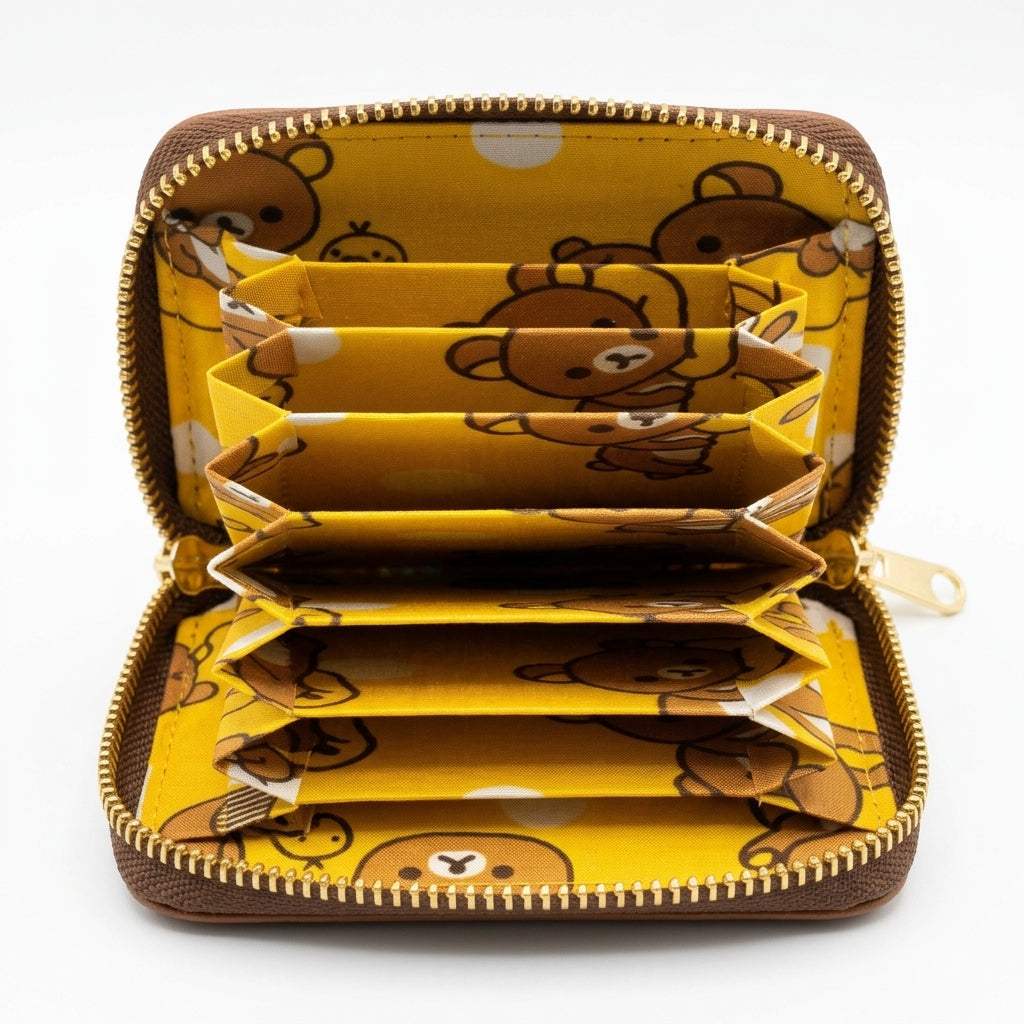 Interior view of San-X Rilakkuma Accordion Card Holder Wallet yellow slots with character pattern